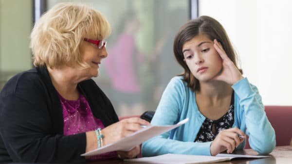 School psychologist speaking to student